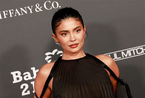 Kylie Jenner Strikes Series Of Sultry Poses In See Thru Dress And