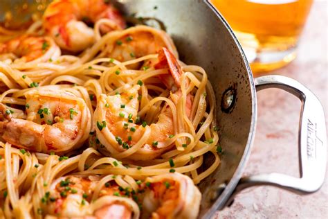 Serve the noodles and shrimp with the grated carrots, chopped green onions, chopped peanuts, chopped cilantro, and chopped red pepper. Asian Stir Fried Shrimp and Rice Noodles Recipe — The Mom 100