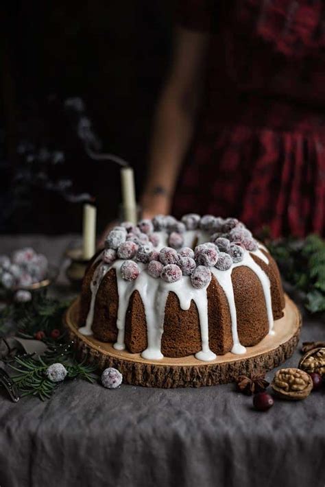 The creator of the recipe tells the story that their mother—the original creator of this recipe—made the bizcocho with a boxed cake mix due to their modest upbringing. Festive cranberry walnut bundt cake with frosted cranberries