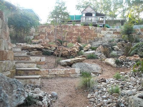 Backyard Landscape Limestone Retaining Wall In The Midst Of A Rock