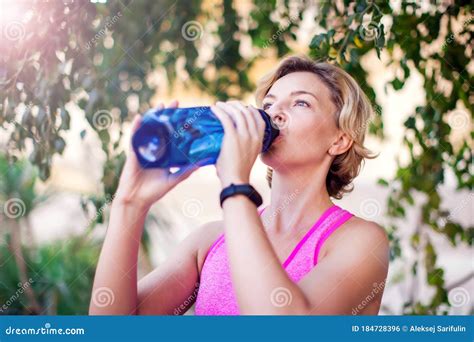 Woman Drinking Water After Exercises Outdoor People Healthcare And