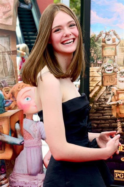 Elle Fanning Unveils Her New Brunette Hair Colour At The Premiere Of Her Film I The Boxtrolls