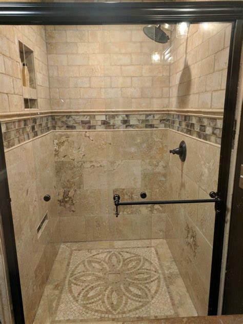 A popular small tile option is glass mosaic tile, and it can be used behind the tub, as the vanity backsplash, or as shelving in the shower. 24 Popular Stone Tiles Designs For Bathroom Shower ...