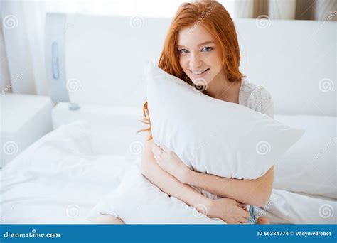 Happy Woman Holding Pillow On The Bed Stock Photo Image Of Lovely