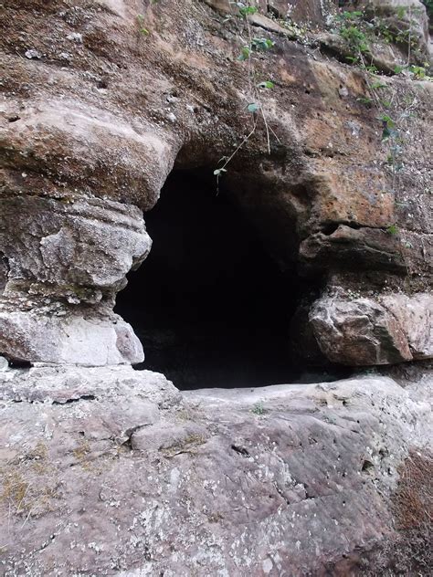 Dark Entrance To The Hermits Cave At Guys Cliffe Cave Entrance