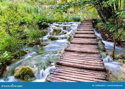 Wooden Pathway Above Water At Plitvice National Park In Croatia Stock