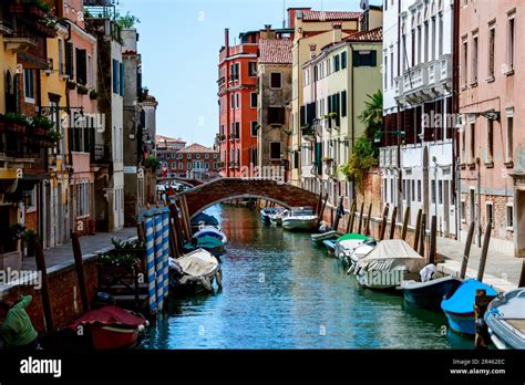 A Picturesque View Of The Classic Venetian Streets Of Italy With