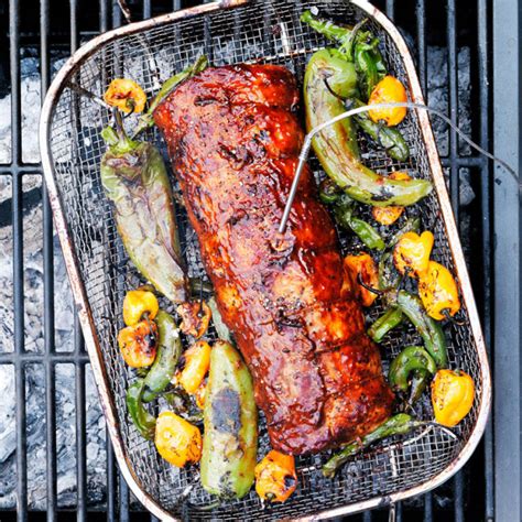 First the lean pork loin is brined overnight, then it's grilled and coated in a fragrant paste before it rests in a mixture of white wine. Maple-Mesquite Grilled Pork Loin | Williams-Sonoma Taste
