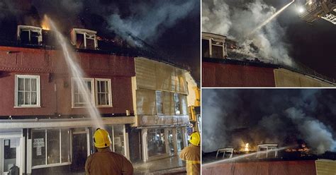 Naked Man Stuck On Burning Building Leaps Onto Passing Double Decker