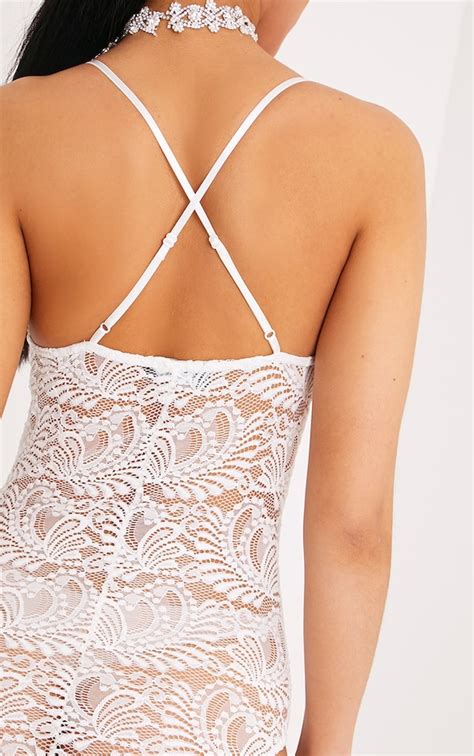 lucille white sheer lace cross back bodysuit prettylittlething