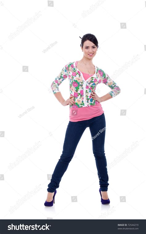 Full Body Young Woman In Casual Clothes Relaxed Pose Isolated Over A