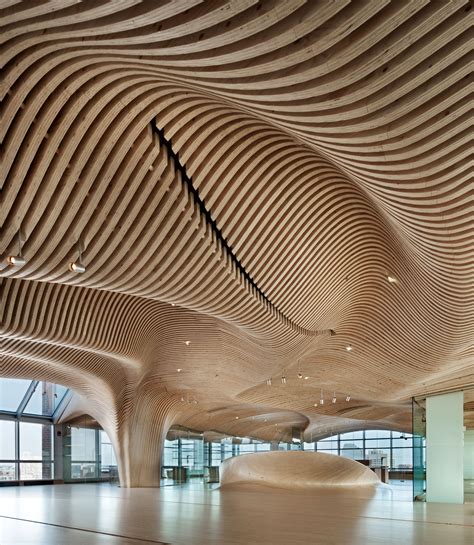 The Wavy Wooden Surfaces That Comprise The Interior Are Built Entirely