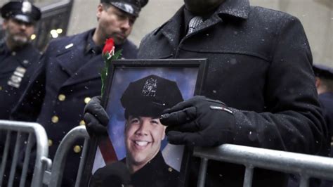 slain nypd officer s wife delivers emotional eulogy at funeral