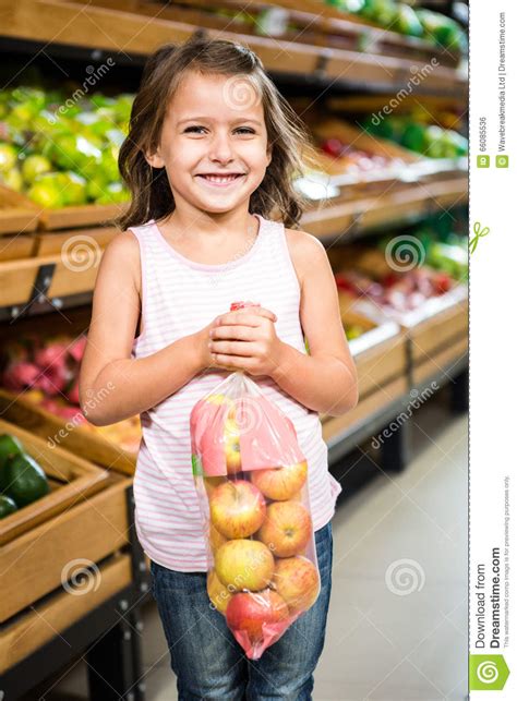Portrait Of Little Girl Holding Apple Stock Photo Image Of Person