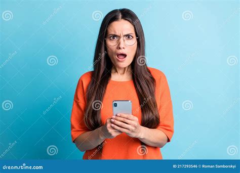 Photo Of Impressed Woman Open Mouth Angry Staring Unexpected Bad Fake News Isolated On Blue