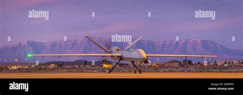 A Usaf Mq 9 Reaper Unmanned Aerial Vehicle Aircraft Lands On The Runway