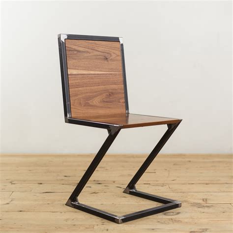 From desk to conference, we have the seating solutions for your space. Walnut and Raw Steel Z-Chair - Factor Fabrication