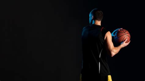 Premium Photo Side View Of Male Basketball Player Tying Shoe Laces