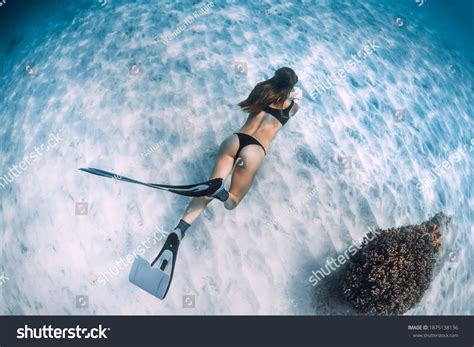 Woman Free Diver Glides Fins Over Stock Photo Shutterstock