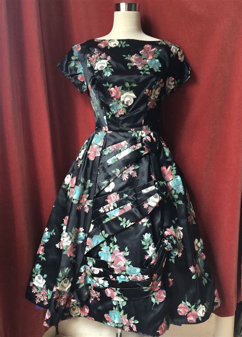 Here are the six best prom dress shops in nyc. Amazing 50s Mad Men black floral duchess satin dress ...