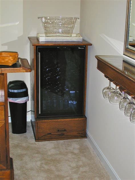 Upper area includes a storage drawer and the lower part features a compartment for small fridge. Pin by Maurice's Furniture on Some of My Custom Furniture ...