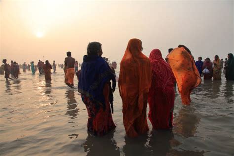 Royalty Free Indian Women Bathing Holy Ganges River Pictures Images