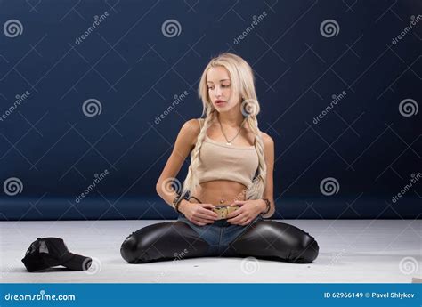 Attractive Blond Woman Sitting On Her Knees Stock Image Image Of Listening City 62966149