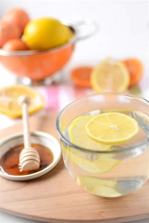 Honey Ginger Lemon Water Recipe Benefits Emily Kyle