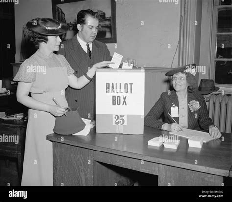 Vintage 1930s Photo Of A Man And Woman Placing Their Votes In A Ballot Box In Washington Dc As