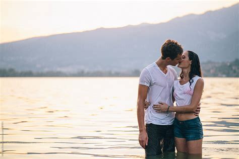 Romantic Couple Kissing By Stocksy Contributor Michela Ravasio Stocksy