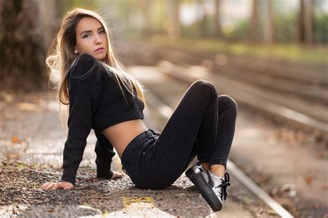 Girl Sitting Bokeh Jeans Rail Track Side Wallpaperhd Girls Wallpapers