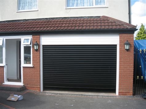 Manufactured with either steel or aluminium, the roller door is essentially a curtain that consists of slats that can roll around itself at the top of the. 10 Crucial Things to Know When Looking For Roll Up Garage ...