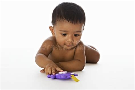 Sweet Indian Baby Playing On Floor Stock Photo Image Of Asian Lying