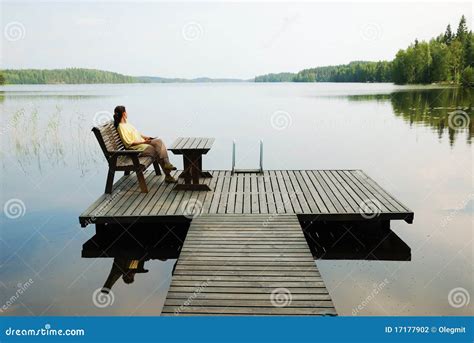Lake With Wooden Platform And Woman Resting Stock Photo Image Of