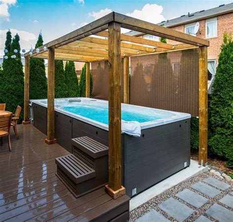 In this case the owners of the hot tub went as natural as their surroundings with a simple diy wood frame made of loose tree limbs that matched their spa case. DIY Hot Tub Privacy: 25+ Inspiring Designs That You Can ...