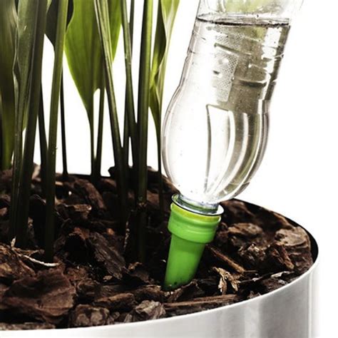 Self-Watering Cones | Self watering bottle, Self watering ... This gorgeous planter looks normal enough, but it's actually two planters in one.