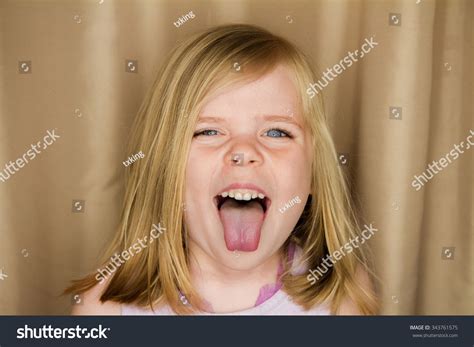Young Girl Sticking Her Tongue Out库存照片343761575 Shutterstock
