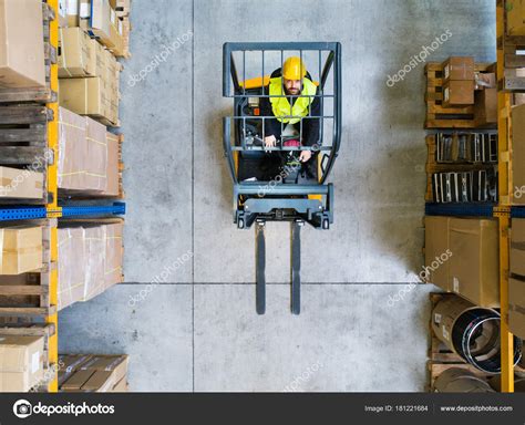 Warehouse Man Worker With Forklift Stock Photo By ©halfpoint 181221684