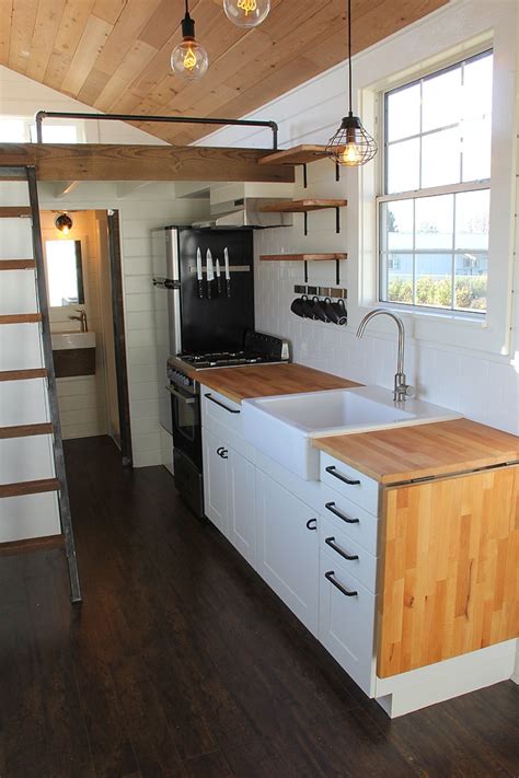 Sharing #tinyhousekitchen design ideas from 10 very different tiny homes. TINY HOUSE TOWN: Modern Rustic Tiny Home in Bellingham