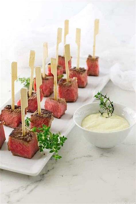 Rub with mustard, then season with pepper, rosemary, and thyme. Beef Steak Bites with Fresh Horseradish Aioli Sauce ...