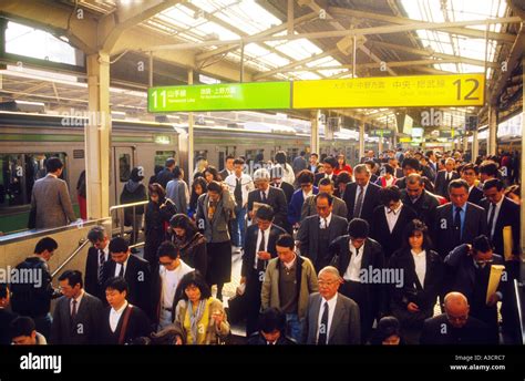 Asia Japan Tokyo Shinjuku Station Rush Hour Crowded Crowds Commuters Train Pushers Push As Many