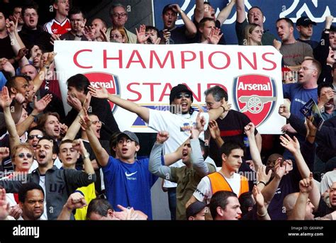 Arsenal Fans Celebrate In The Stands After Their Barclaycard