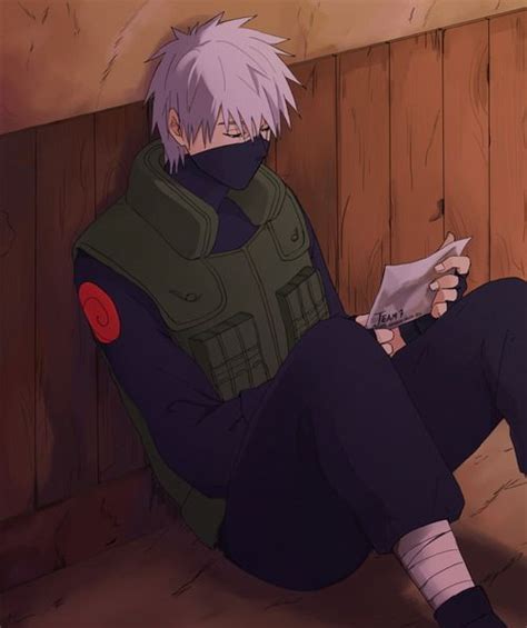 Kakashi Ohi Just Realised That He Is Holding The Photo Of Team 7