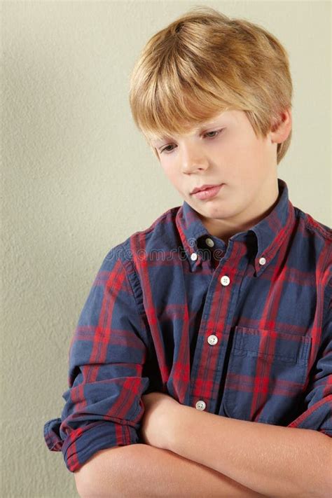 Unhappy Boy Being Gossiped About By Other Children Stock Photo Image