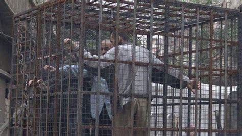 Caged Hostages From Syrian Presidents Sect Paraded Through Rebel Held