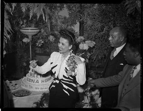 Lena Horne Standing Next To Cake Inscribed “greetings Lena Horne” With