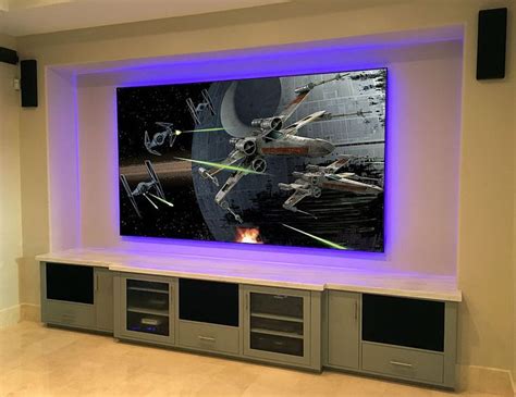 Built In Entertainment Center Under A Huge Movie Screen Furnishings
