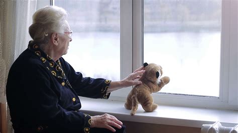 A Lonely Old Woman Looking Out Window With Stock Footage Sbv 320244274