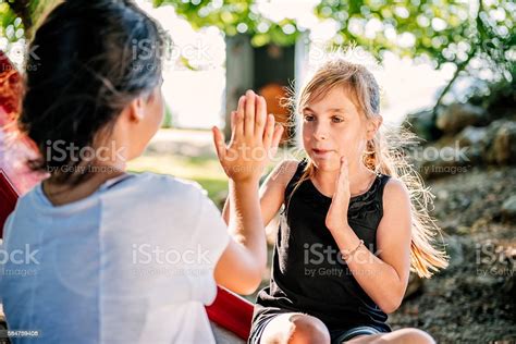 Girls Playing Hand Clapping Game Stock Photo Download Image Now