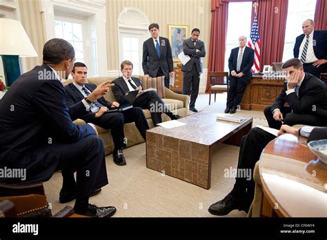 President Barack Obama Meets With Staff In The Oval Office Before A